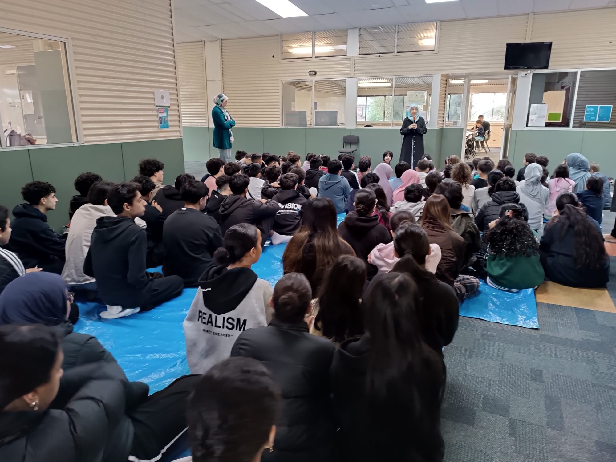 Maryam telling a story to children at Bene Kids in Melbourne